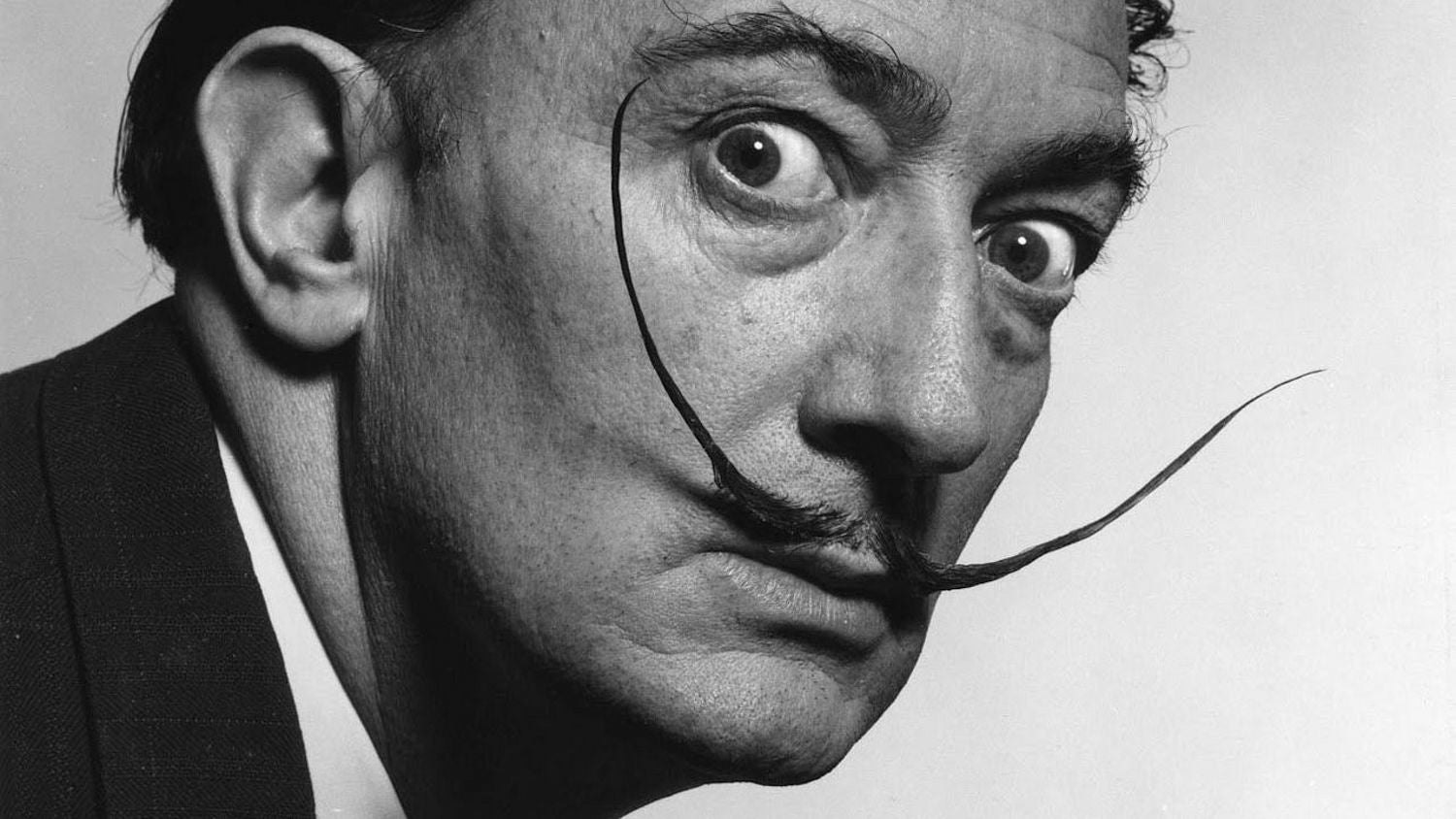 Portrait of Salvador Dali, surrealist artist, known for his eccentric style and imaginative artworks